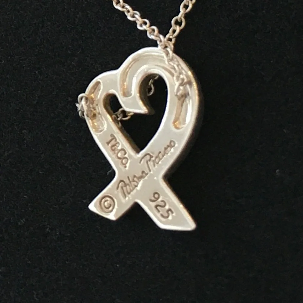 Tiffany & Co. excellent pre
